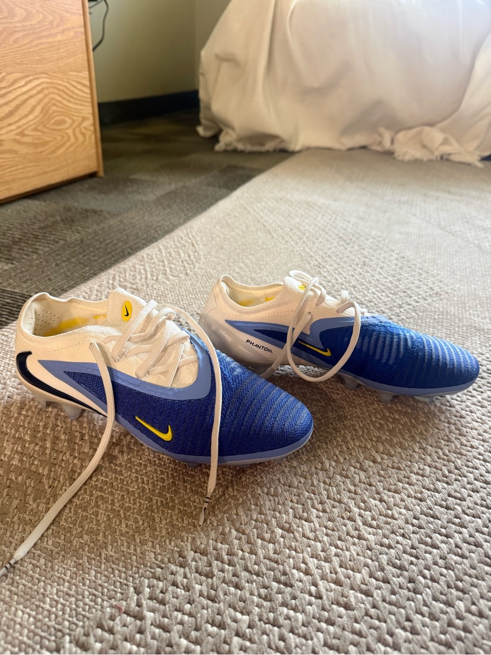 Nike Men's Blue/White Soccer Cleats with Yellow Accents